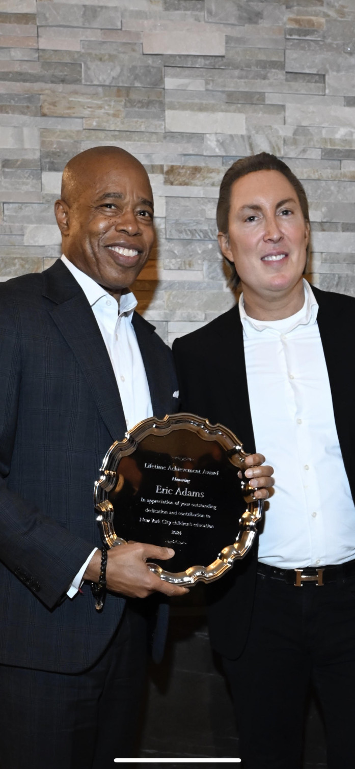 Eric Adams receives a Lifetime Achievement Award from Promise Project Founder Daniel Neiditch